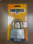 Master Fortress 1805D Steel Shackle Laminated Padlock, 2". Fixed Price $13.99.