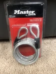 Master Lock 65DPK2 Self-coiling Steel Cable 1/4 In. X Ft. With Looped Ends. Fixed Price $7.99.